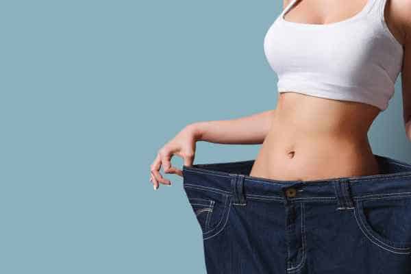 woman after fat reduction treatment Old Trafford