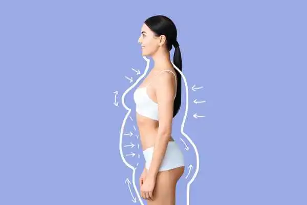 image of woman experiencing fat reduction treatment Old Trafford