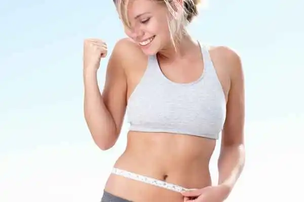 woman happy after fat reduction treatment Old Trafford